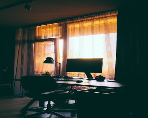 Desk positioned to avoid direct sunlight glare
